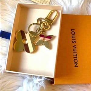 Authentic Louis Vuitton flower stripe charm